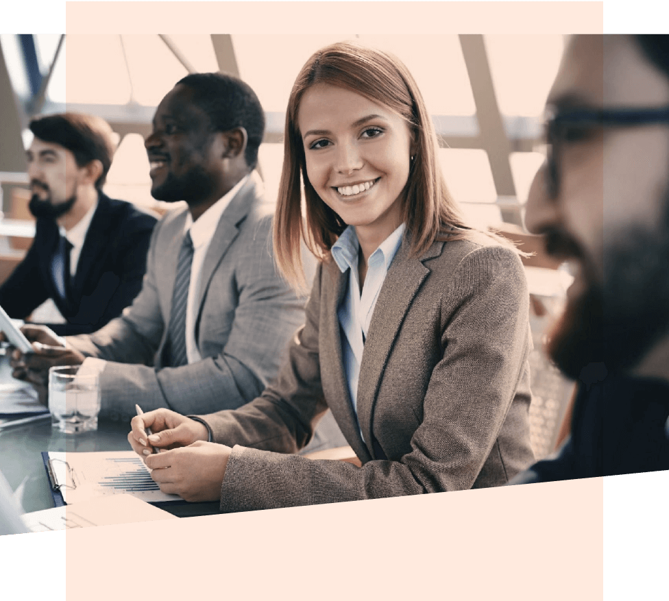 Woman smiling at the camera during a meeting